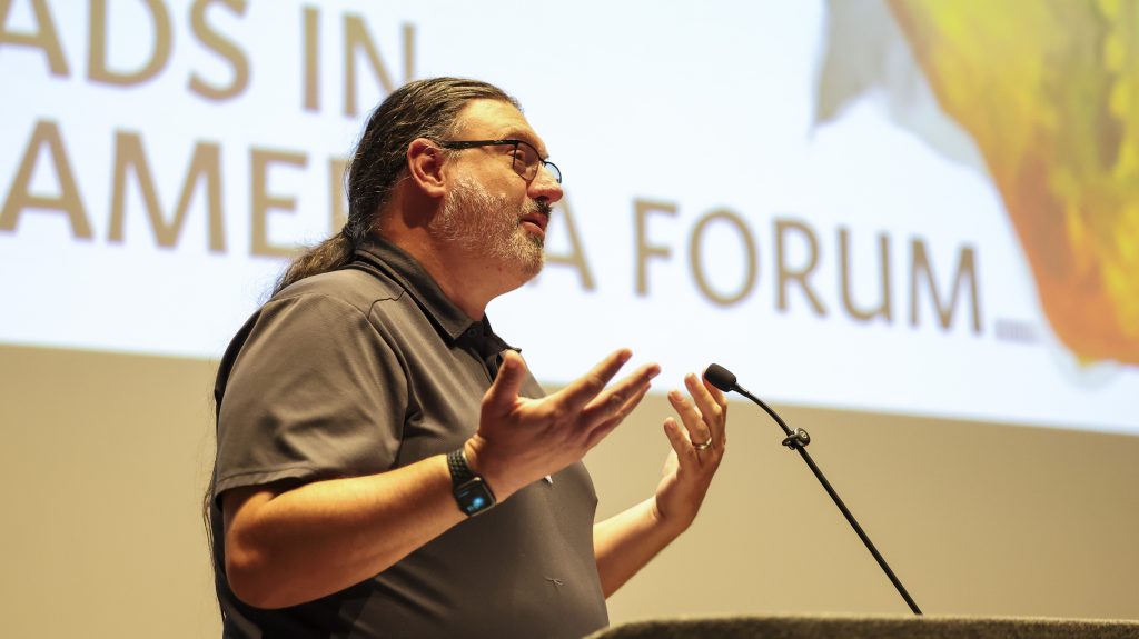 James Sarmento speaks at forum.